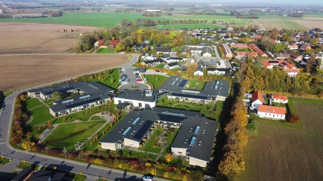 Residential complex and surrounding farmland at Gammel Ega near Aarhus, Denmark, aerial