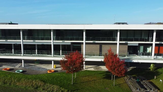 Modern office building with large windows and landscaping at Gammel Ega near Aarhus, Denmark