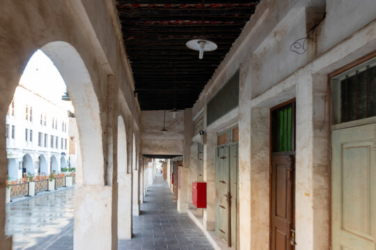 Doha, Qatar - Souq Waqif in Doha, Qatar, showcasing its traditional Qatari architecture, narrow pathways, heritage buildings, shops, and vibrant atmosphere. 