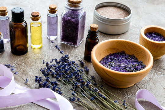 organic cosmetics with lavender on wooden background