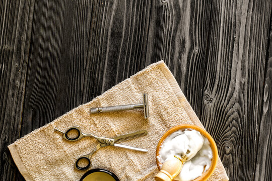 Tools for cutting beard barbershop top view on wooden background