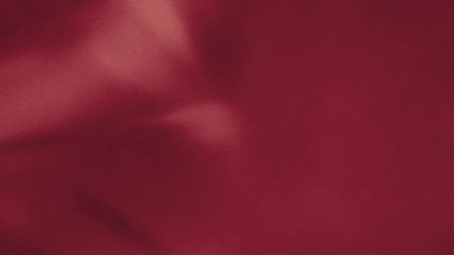Velvet Nap Sweep Soft Suede Texture Background With Copy Space Seamless Loop in bright burgundy tones