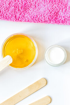 concept depilation with wax on white background top view