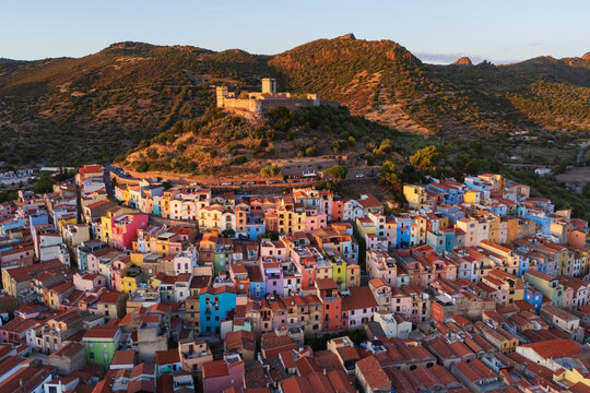 Sunset aerial view of bosa old town with hilltop castle