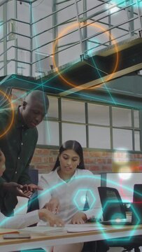 Vertical video: Man checking phone and pointing, woman leading business docs review, AR overlaying