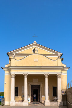 Front view of Sanctuary of&nbsp;Madonna dell'Angelo church an in Caorle on the Adriatic Sea coast on sunny summer day, Metropolitan of Venice, Veneto, Italy