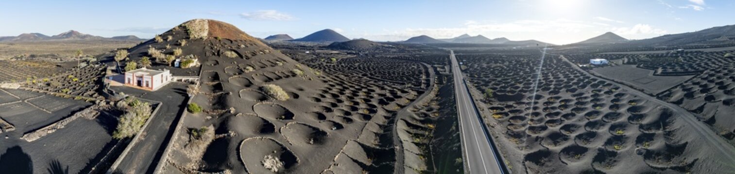 Typical drywall viticulture in volcanic landscape, on volcanic ash, lapilli, aerial view, vines, La Geria wine-growing region, Lanzarote, Canary Islands, Spain