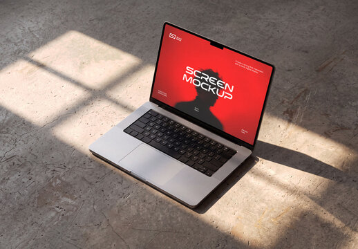 Laptop Screen Mockup on Concrete Floor