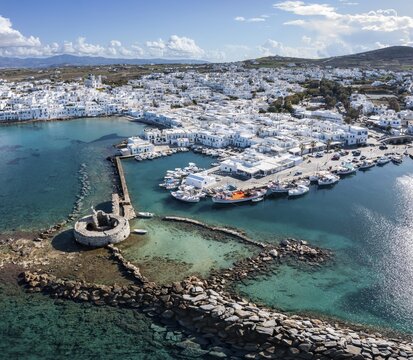 Aerial view, town view and harbour of Naoussa, harbour wall with Venetian ruins, Paros, Cyclades, Greece