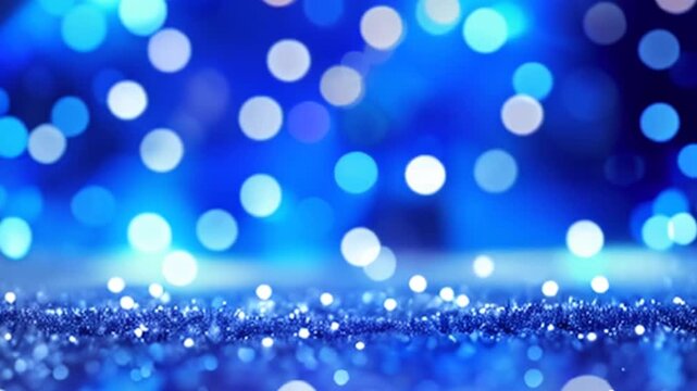 Background with lights in blue and silver tones with out of focus lights.