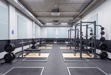 Fototapeta premium long spatial view of a architectural athletic venue: contemporary spatial design within a sports building