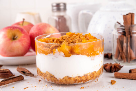 No Bake Apple Pie in a Jar, Layered Pumpkin parfait Dessert with crumbled cinnamon graham crackers, whipped creamy cheesecake, spiced Apple jam