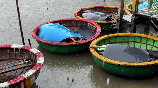 Hoi An, Da Nang, Vietnam - River Journey Through the Jungle on a Round Coconut Basket Boat, Brown River Waters, Traditional Vietnamese Hats, Overcast Rainy Weather, Authentic Round Boats, Exploring 