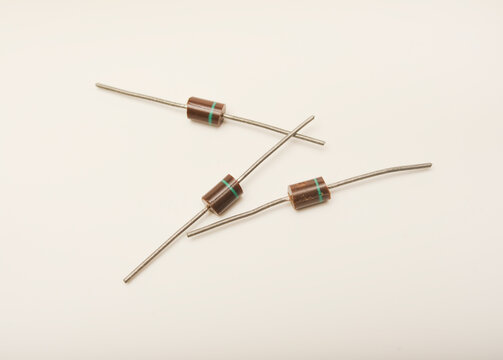 Old diodes. Brown plastic diodes. Old semiconductors with axial leads.