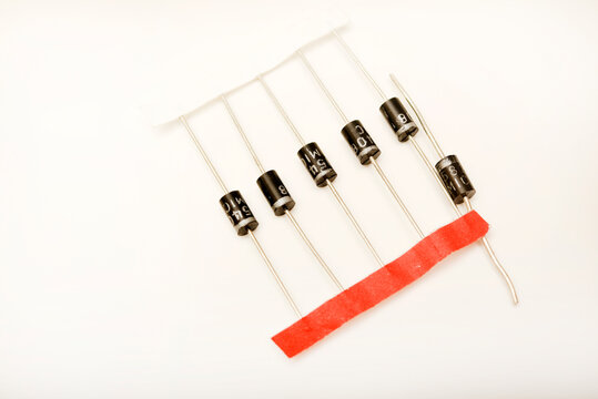New diodes. Black plastic diodes. Semiconductors with axial leads.