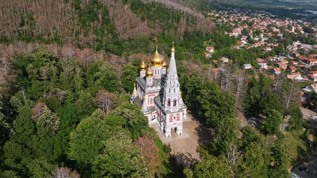 Shipka Memorial Church Aerial Drone Top View Orthodox Temple Golden Domes Lush Green Forest Village Background Summer Travel History Bulgaria