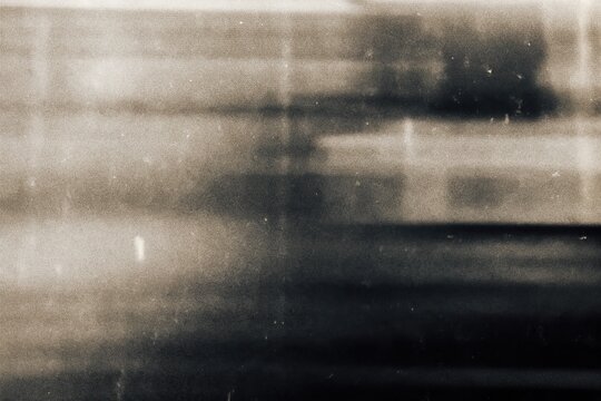 Distressed dark gray dither screen background with retro pixel grain noise texture