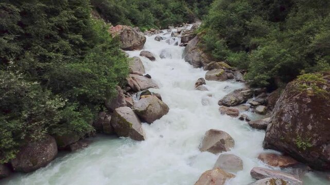 Alpine river rapids in Hohe Tauern national park: Close up view of a mountain stream with white water and rocks in the Kitzb&uuml;hel Alps, Austria