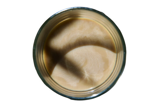 a glass of iced coffee with circler shadows Isolated on transparent background&nbsp;