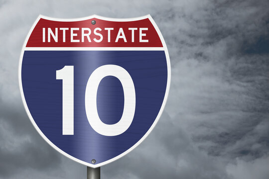 American Interstate I10 sign with stormy sky for transportation