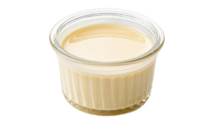 Creamy custard dessert in a fluted glass ramekin, isolated on transparent background © Nolan