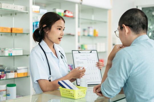 A woman and a man are in a pharmacy