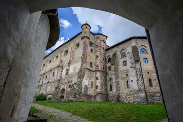 Stone archway framing the inner courtyard palace of the Old Castle, Banska Stiavnica, Slovakia © Michal Plevko