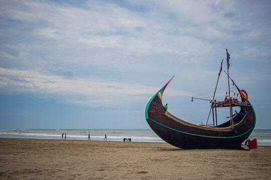 Curved Wooden Fishing Boat on Cox's Bazar Beach