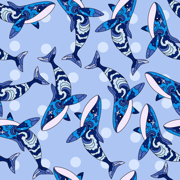 Blue humpback whales with stylized ocean waves seamless pattern
