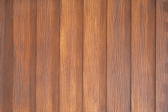 Rich mahogany wood grain texture for interior design backgrounds and rustic home decor presentation