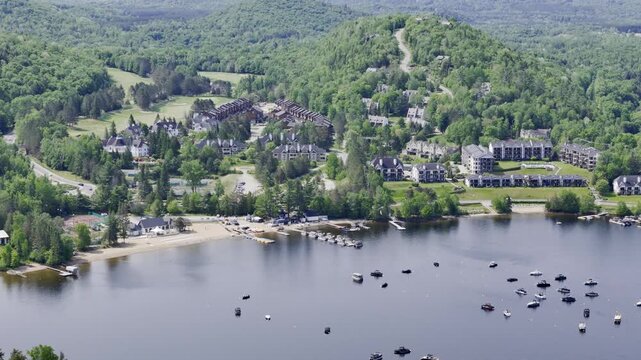Aerial view of Mont Tremblant resort village, Quebec, Canada with lake, forest and mountain landscape in summer. g.