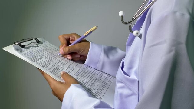 Doctor taking medical notes