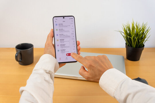 Smartphone user reporting suspicious email message for digital security