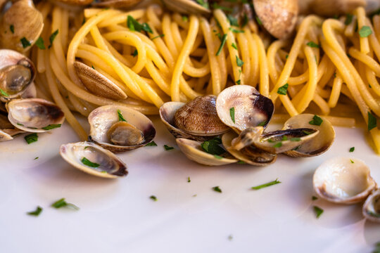 Close up view of Italian Spaghetti alle Vongole (Spaghetti with Clams), typical Mediterranean food in Italy.