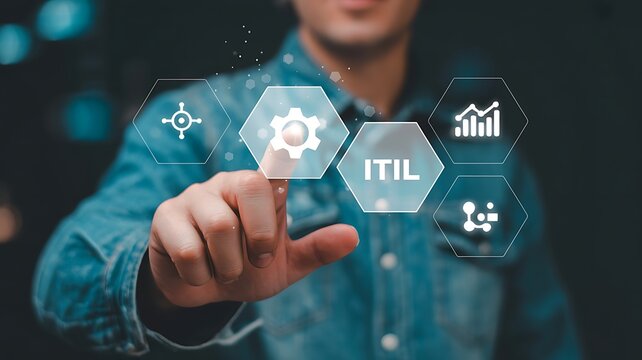 Man's finger touching ITIL concept with gear icon and business analytics graph in dark background