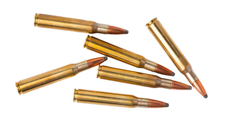 Bullets arranged on a flat surface showing detail of cartridge design and structure © fotofabrika