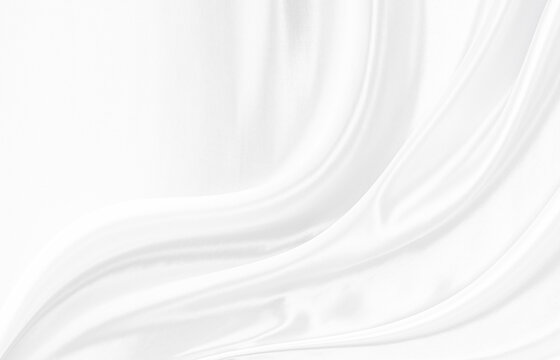 White gray satin texture that is white silver fabric silk background with beautiful soft blur pattern natural.