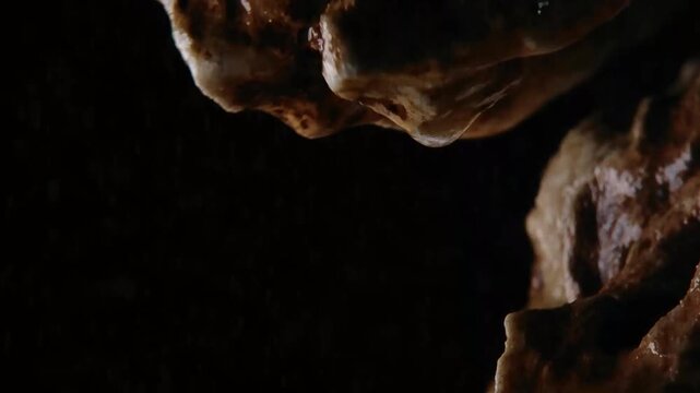 Cinematic raindrop falling on textured rock edge BMA Visuals Horizontal Video