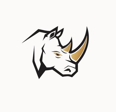 Strong rhino head logo with gold horn on white background, modern rhinoceros vector mascot illustration design