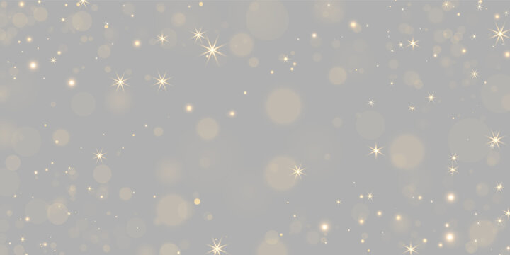 Scattered golden starbursts twinkle over a dark backdrop. The lights vary in size, creating depth with bright and soft glows. Ideal for festive or magical themed digital designs and.