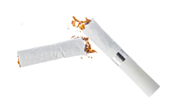 Broken cigarette on a white background indicating the end of smoking