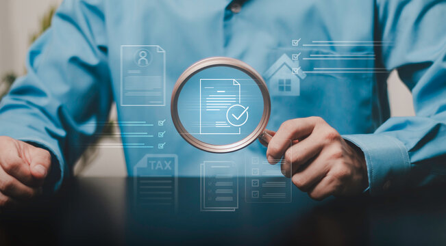 Document review and compliance. Professional using a magnifying glass to inspect digital records, forms, tax information, checklist, property data, and verification documents online.