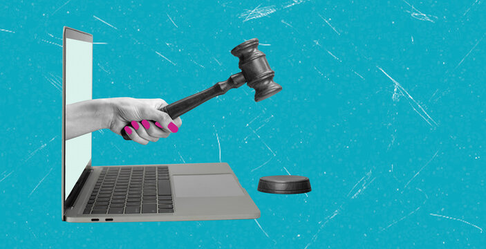 Judge's Gavel Emerging from Laptop, Digital Law and Online Justice Concept
