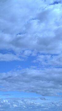Light clouds are moving across the blue sky