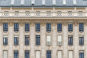 Repetitive columns and wrought iron balconies on a Neoclassical apartment facade at Vorosmarty ter, Budapest © Guillaume Angleraud