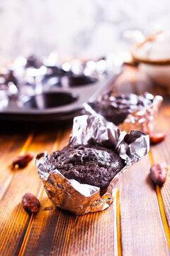 Chocolate chip muffins mini size on a board, double chocolate muffins,