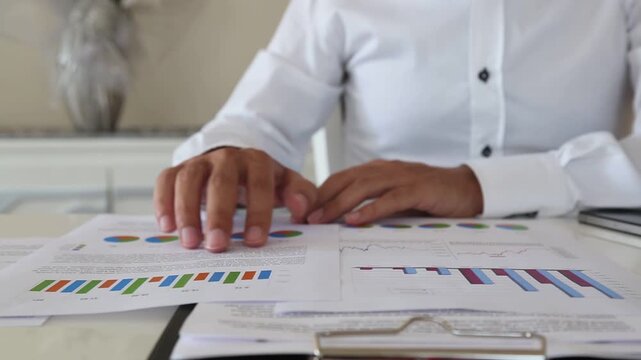 Professional Reviewing Financial Documents and Entering Data