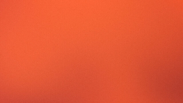 Soft blood orange color grain with blurred gradient, abstract chromatic noise, colorful texture, and diffused warm tones for a decorative background