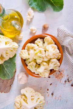 Head of cauliflower sits on a light table