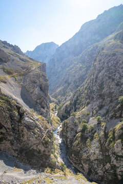 Ruta del Cares gorge with river flowing through mountains in Picos de Europa